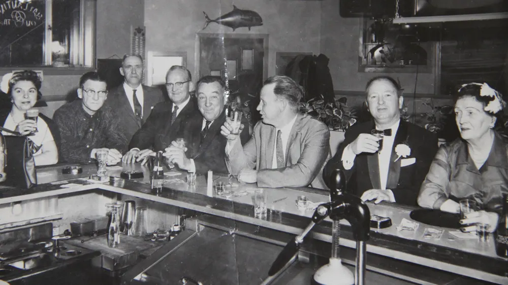 A black and white photo of the bar in the 1940s or 50s