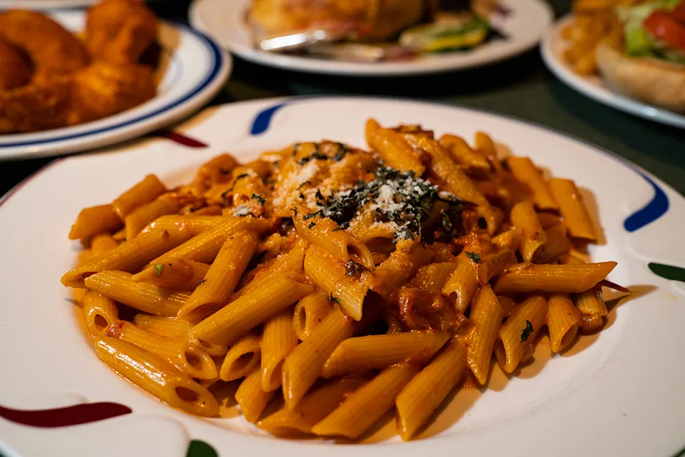 Penne pasta in orange sauce